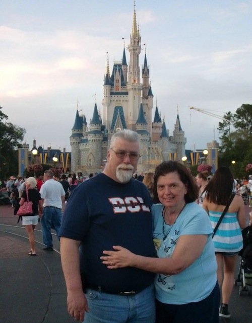 Mom And Dad In Front Of Disney Castle